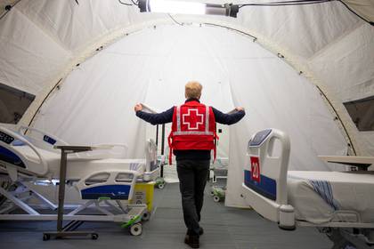 A Red Cross volunteer at a temporary hospital in Quebec, Canada (Reuters)